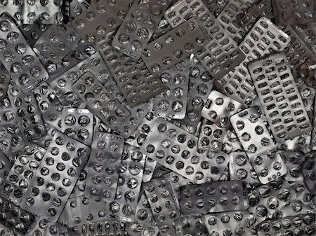 simsearch:400-04902997,k - Empty packings from tablets and pills of silver colour Photographie de stock - Aubaine LD & Abonnement, Code: 400-04194663