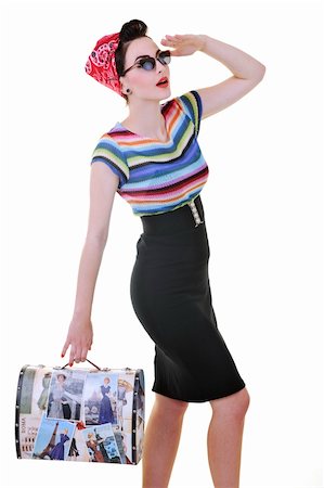 simsearch:400-08264249,k - pretty young happy woman with travel bag waiting and posing isolated on white in studio Stock Photo - Budget Royalty-Free & Subscription, Code: 400-04195060