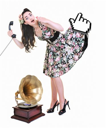 pretty young woman talking by old phone and mouse cursor arrow is holding her skirt Stock Photo - Budget Royalty-Free & Subscription, Code: 400-04195082