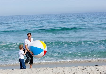 simsearch:400-04114591,k - Father and his son having fun at the beach Stock Photo - Budget Royalty-Free & Subscription, Code: 400-04195326