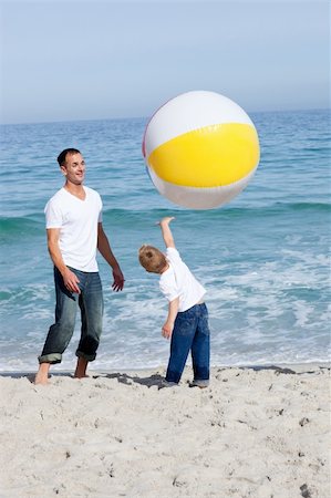 simsearch:400-04114591,k - Happy father and his son playing with a ball at the beach Stock Photo - Budget Royalty-Free & Subscription, Code: 400-04195328