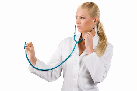 simsearch:400-04178933,k - medical doctor woman with stethoscope Isolated over white background in act to visit Stock Photo - Budget Royalty-Free & Subscription, Code: 400-04195496