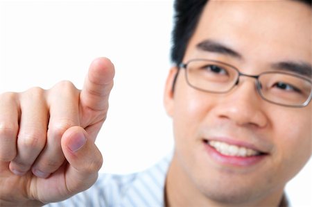 Asian business man pressing on a blank space Stock Photo - Budget Royalty-Free & Subscription, Code: 400-04196056