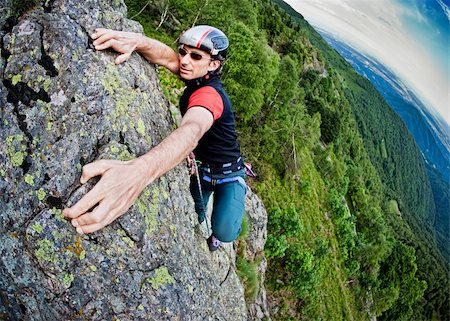 rcaucino (artist) - Young white man climbing a steep wall in mountain, rock-climb extreme sport, summer season. Horizontal orientation Photographie de stock - Aubaine LD & Abonnement, Code: 400-04197101