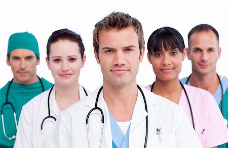 dr in surgical uniform - Portrait of a concentrated medical team against a white background Stock Photo - Budget Royalty-Free & Subscription, Code: 400-04197789
