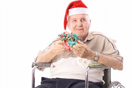 simsearch:400-05147195,k - eldery man in wheelchair celebrating christmas Stock Photo - Budget Royalty-Free & Subscription, Code: 400-04197979