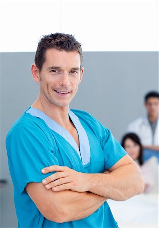 simsearch:400-04281577,k - Portrait of a confident doctor at the hospital Photographie de stock - Aubaine LD & Abonnement, Code: 400-04198270