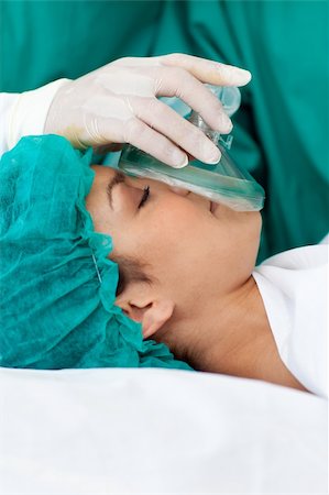 Female patient receiving anaesthetic in the hospital Stock Photo - Budget Royalty-Free & Subscription, Code: 400-04198388