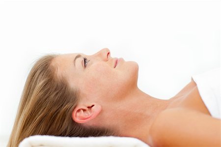 simsearch:400-05125882,k - Portrait of calm woman relaxing after a spa treatment against a white background Fotografie stock - Microstock e Abbonamento, Codice: 400-04199057