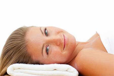 simsearch:400-05125882,k - Portrait of charming woman relaxing after a spa treatment against a white background Fotografie stock - Microstock e Abbonamento, Codice: 400-04199060