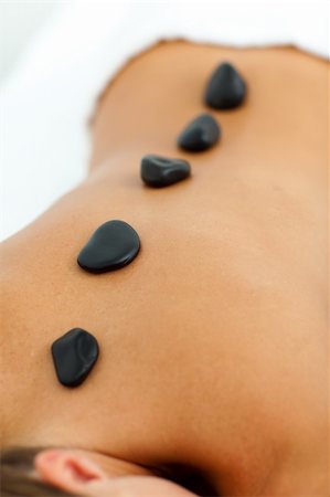 simsearch:400-05125882,k - Relaxed woman getting spa treatment with stones Fotografie stock - Microstock e Abbonamento, Codice: 400-04199074