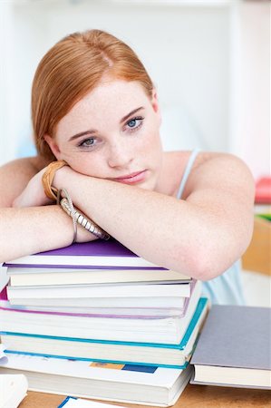 students working at library table - Tired teeenager sleeping in a library after studying long time Stock Photo - Budget Royalty-Free & Subscription, Code: 400-04199299