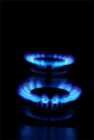 flames of gas stove in the dark Stock Photo - Budget Royalty-Free & Subscription, Code: 400-04199466