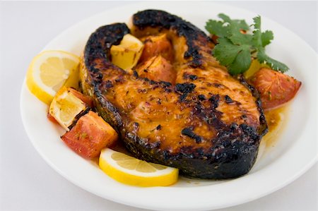 broiled salmon steak on white plate Stock Photo - Budget Royalty-Free & Subscription, Code: 400-04199827