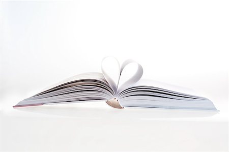 Detail of open book with heart shape, close-up Photographie de stock - Aubaine LD & Abonnement, Code: 400-04199922