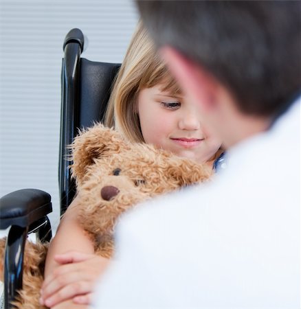 simsearch:400-05147195,k - thinking little girl sitting on the wheelchair at the hospital Stock Photo - Budget Royalty-Free & Subscription, Code: 400-04190185