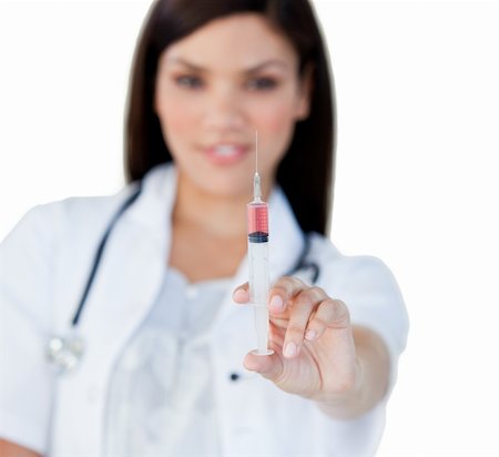 simsearch:400-04513453,k - Professionnal female doctor holding a syringe in a hospital Stock Photo - Budget Royalty-Free & Subscription, Code: 400-04190187