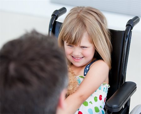simsearch:400-05147195,k - Reserved little girl sitting on the wheelchair at the hospital Stock Photo - Budget Royalty-Free & Subscription, Code: 400-04190189