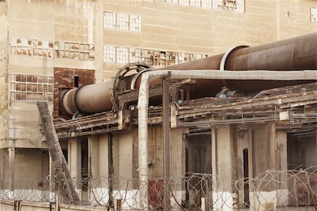 pipe system in refinery - Old Ukrainian plant of cement production Stock Photo - Budget Royalty-Free & Subscription, Code: 400-04190331