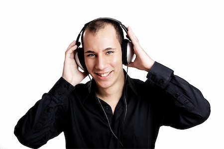 Portrait of a young man listening music with headphones Stock Photo - Budget Royalty-Free & Subscription, Code: 400-04190380