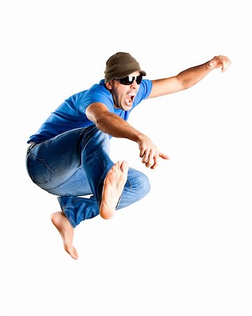 simsearch:400-07481076,k - Young man jumping isolated over a white background Photographie de stock - Aubaine LD & Abonnement, Code: 400-04190422