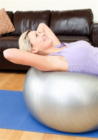 Calm woman doing exercice at home Stock Photo - Budget Royalty-Free & Subscription, Code: 400-04190774