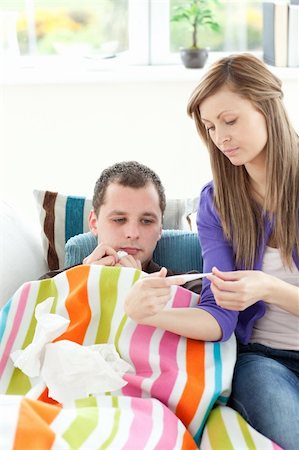 simsearch:400-04212905,k - Radiant woman taking care of her husband at home Stock Photo - Budget Royalty-Free & Subscription, Code: 400-04190815