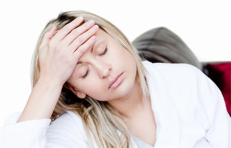 Sick woman have a headache  against a white background Fotografie stock - Microstock e Abbonamento, Codice: 400-04190845