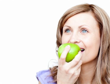 Cute woman holding an apple against a white background Stock Photo - Budget Royalty-Free & Subscription, Code: 400-04191936