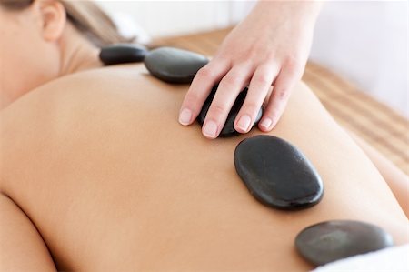 simsearch:400-04192103,k - Close-up of a woman relaxing on a massage table against a white background Stock Photo - Budget Royalty-Free & Subscription, Code: 400-04192088