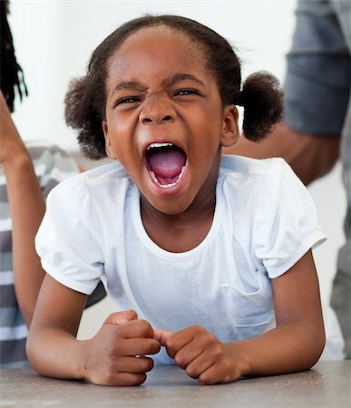 simsearch:400-07681479,k - Angry little girl shouting in the kitchen Stock Photo - Budget Royalty-Free & Subscription, Code: 400-04192498