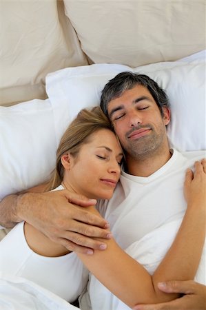 romantic pictures of lovers sleeping - Loving couple sleeping  lying in bed Stock Photo - Budget Royalty-Free & Subscription, Code: 400-04193039