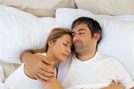 Caring lovers sleeping lying in the bed at home Stock Photo - Budget Royalty-Free & Subscription, Code: 400-04193033
