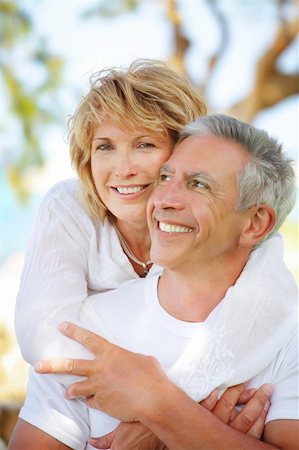 Close-up portrait of a mature couple smiling and embracing. Stock Photo - Budget Royalty-Free & Subscription, Code: 400-04193347