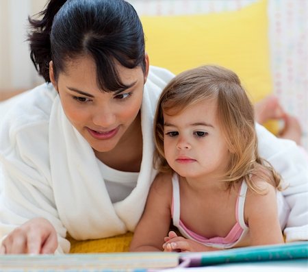 simsearch:400-04712944,k - Mother and daughter doing homework together at home Stock Photo - Budget Royalty-Free & Subscription, Code: 400-04193417