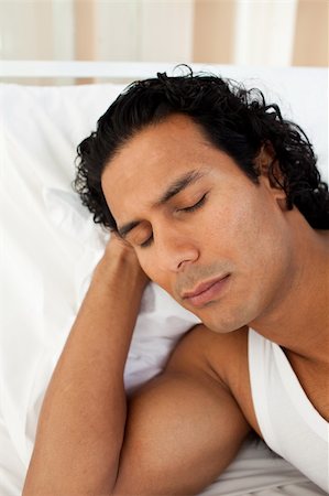 simsearch:400-04192370,k - Attractive man sleeping on the bed at home Fotografie stock - Microstock e Abbonamento, Codice: 400-04193410