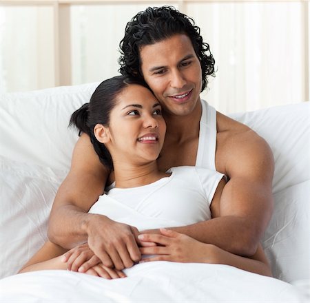 simsearch:400-04150404,k - Happy couple in love lying on the bed Stock Photo - Budget Royalty-Free & Subscription, Code: 400-04193453