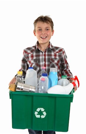 A happy smiling boy carrying a container bin of cans and bottles suitable for recycling.  White background. Stock Photo - Budget Royalty-Free & Subscription, Code: 400-04193705