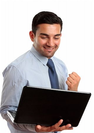simsearch:400-03996768,k - A happy excited business man with holding a laptop and showing a fist of success, or victory.  White background. Stock Photo - Budget Royalty-Free & Subscription, Code: 400-04204136