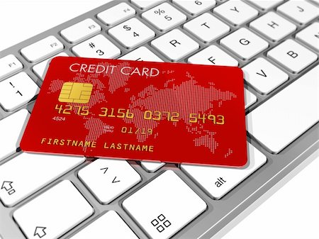 simsearch:400-04382597,k - Red credit card on a computer keyboard Stock Photo - Budget Royalty-Free & Subscription, Code: 400-04204340