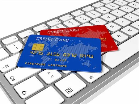 simsearch:400-04376788,k - blue and red credit cards on a computer keyboard Stock Photo - Budget Royalty-Free & Subscription, Code: 400-04204341
