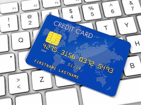 simsearch:400-04382597,k - Blue credit card on a computer keyboard Stock Photo - Budget Royalty-Free & Subscription, Code: 400-04204342