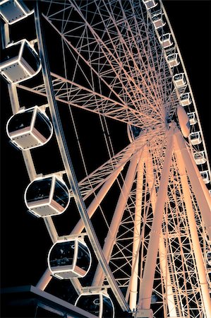 fairground rides circles - Sky wheel illuminated at night Stock Photo - Budget Royalty-Free & Subscription, Code: 400-04204416