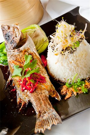 simsearch:400-04505555,k - Australian Barramundi, served with fragrant Jasmine rice and wilted bok choy Foto de stock - Royalty-Free Super Valor e Assinatura, Número: 400-04204436