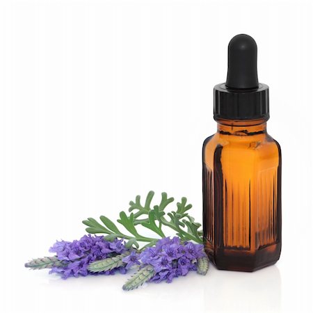 Lavender herb flower leaf sprigs with an aromatherapy essential oil dropper bottle, isolated over white background. Stock Photo - Budget Royalty-Free & Subscription, Code: 400-04205220