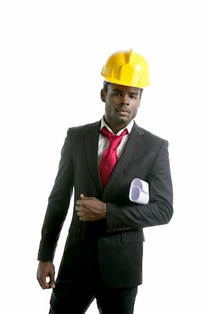 African american architect engineer with yellow hardhat and plans Stock Photo - Budget Royalty-Free & Subscription, Code: 400-04205416