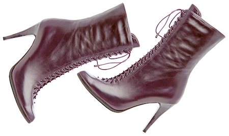 Two female violet boots on white background. Isolated with paths Foto de stock - Super Valor sin royalties y Suscripción, Código: 400-04205763