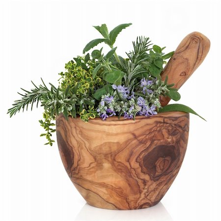sage flower - Herb leaf selection of golden thyme, oregano, purple sage, mint and  rosemary in flower in a rustic olive wood mortar with pestle, isolated over white background. Stock Photo - Budget Royalty-Free & Subscription, Code: 400-04206016