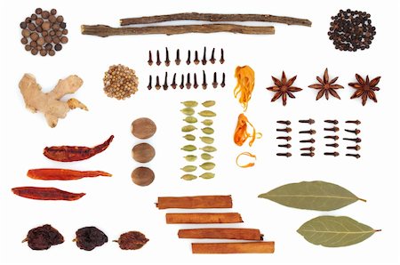 Spice and herb selection  in an abstract design, isolated over white background. Foto de stock - Super Valor sin royalties y Suscripción, Código: 400-04206020