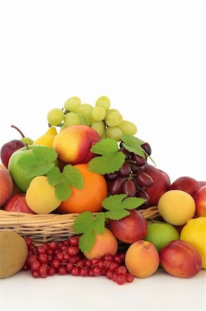 Citrus, berry and tropical fruit selection in a basket with hop leaf sprigs, isolated over white background. Stock Photo - Budget Royalty-Free & Subscription, Code: 400-04206367